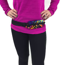 Load image into Gallery viewer, Spibelt Glide running belt black and rave on girl